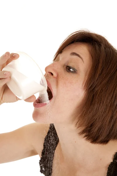 Pouring sugar in mouth — Stock Photo, Image