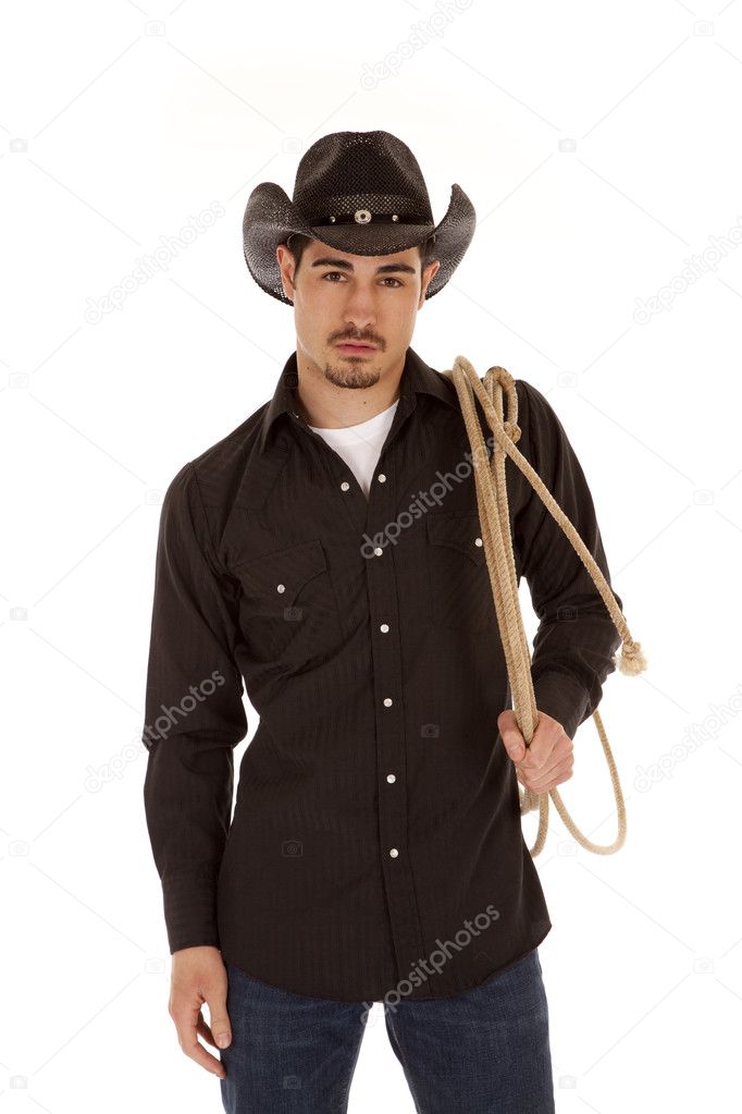 Cowboy holding rope over shoulder