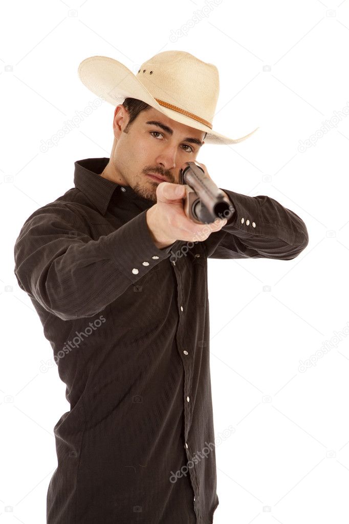 Cowboy pointing shotgun