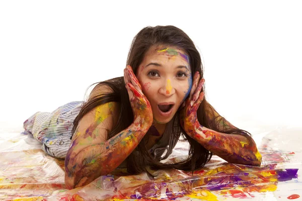 Laying in paint surprised — Stock Photo, Image