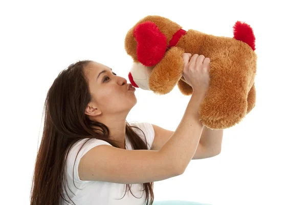 Woman kissing bear — Stock Photo, Image