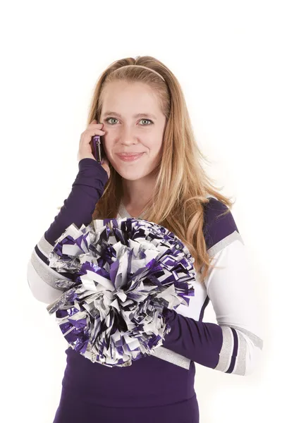 Cheerleader glimlach op telefoon — Stockfoto
