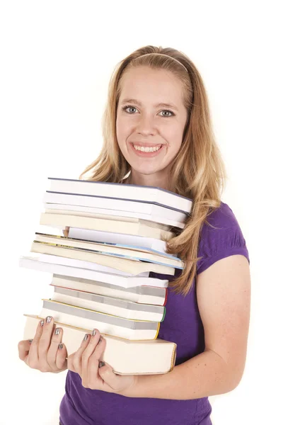 Chica pila de libros sonrisa — Foto de Stock