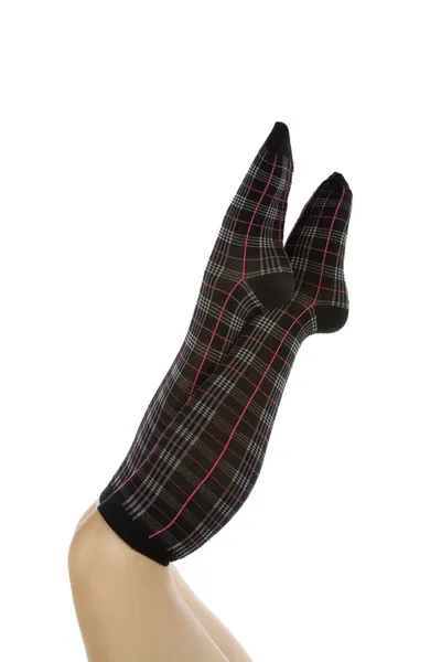 Black and pink socks legs crossed — Stock Photo, Image