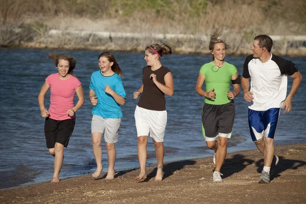 Family jogging together — Stock Photo, Image