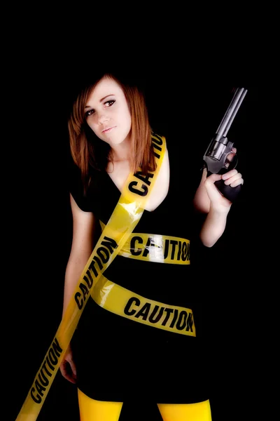 Pistola amarilla precaución grave — Foto de Stock