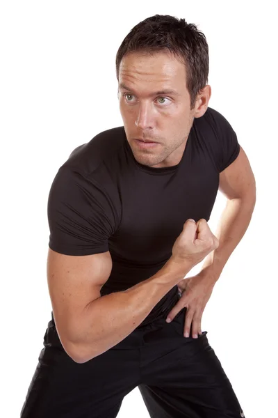 Man flexing looking to side — Stock Photo, Image