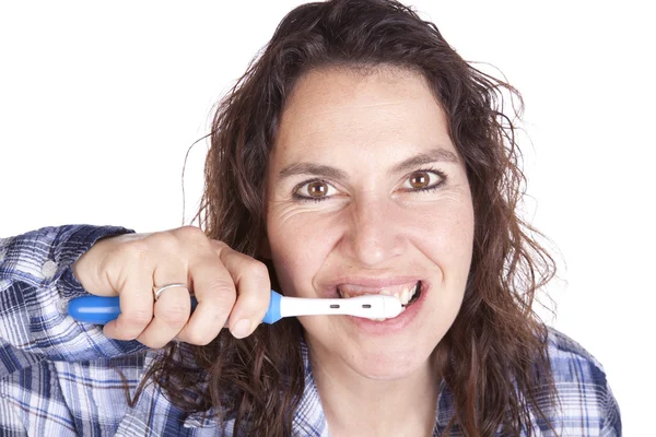 stock image Woman brushing teeth close