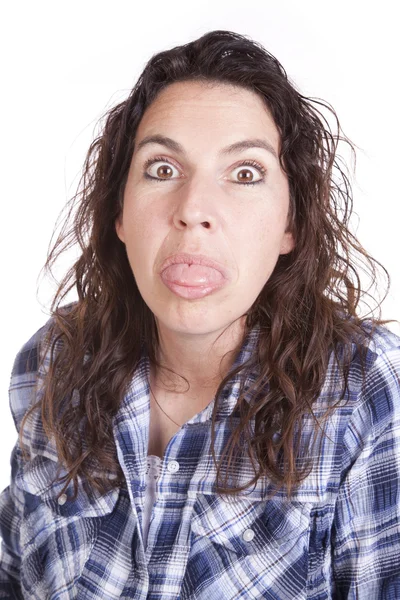 Vrouw expressie blauwe tong uit. — Stockfoto