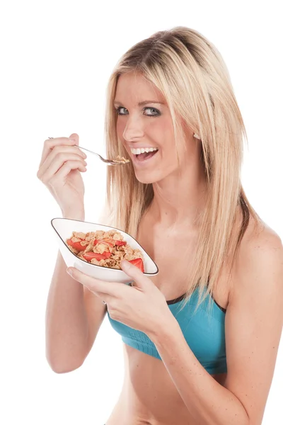 Woman fitness eating cereal — Stock Photo, Image