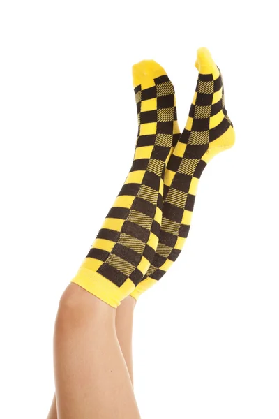 Woman socks yellow black up high — Stock Photo, Image