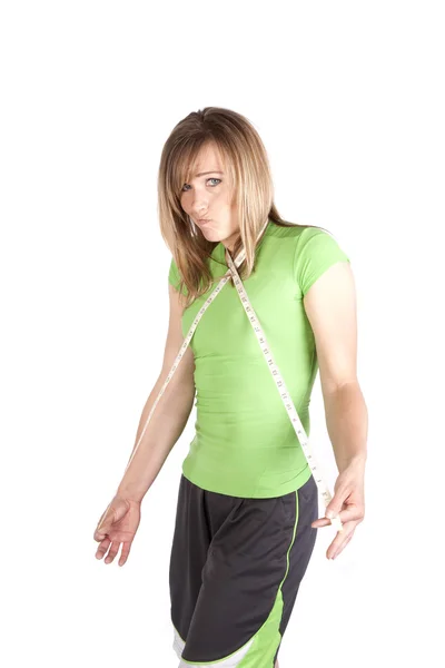 Žena s měřící páska kolem krku legrační obličej — Stock fotografie
