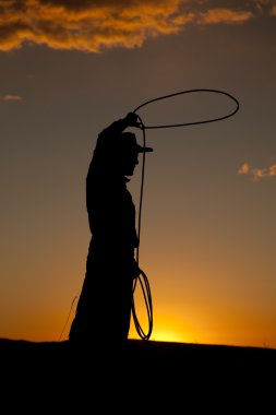 Cowboy silhouette twirl rope clipart