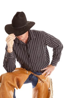 Cowboy touching hat leaning clipart