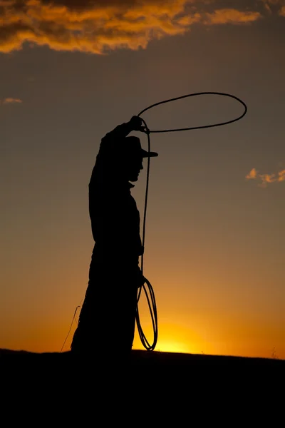 Cowboy silhouette twirl rope — Stock Photo, Image