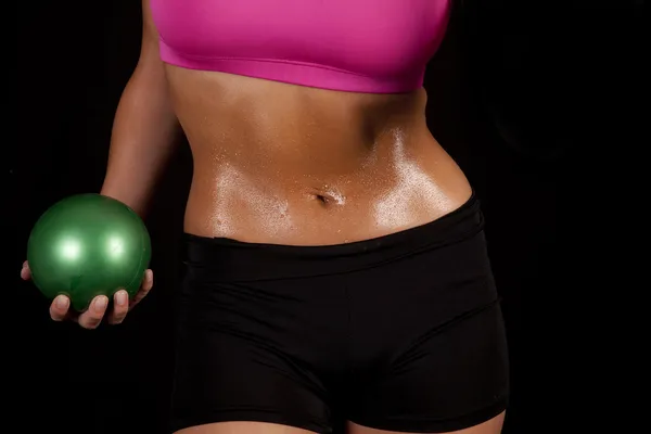 Woman stomach green ball — Stock Photo, Image