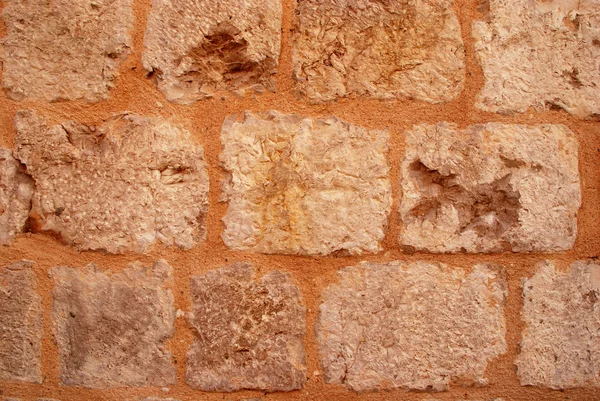 Oude middeleeuwse stenen muur achtergrond — Stockfoto
