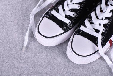 Black canvas sneakers clipart