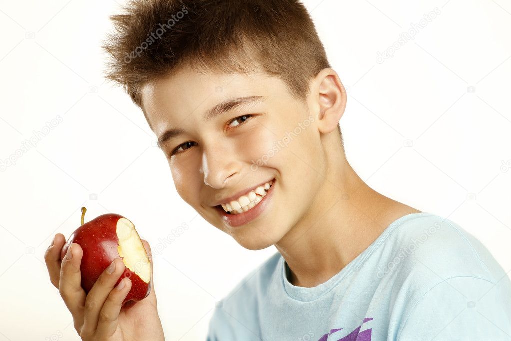 Boy eat apple