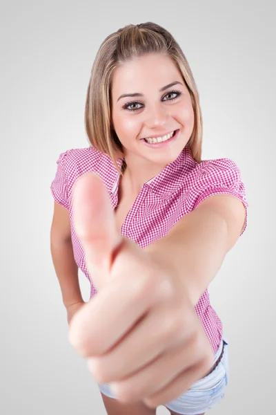 Young beautiful woman portrait makes ok with hands — Stock Photo, Image