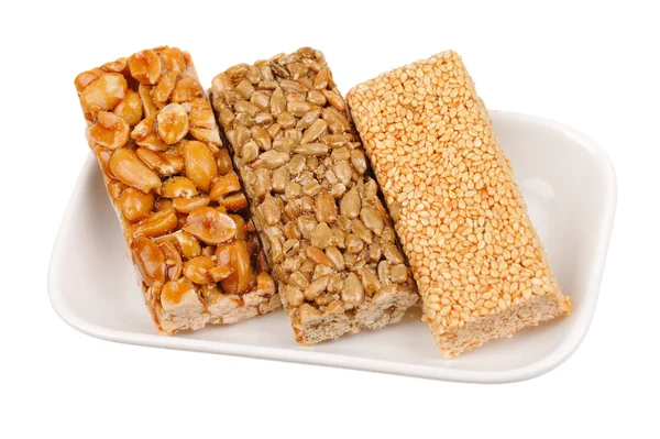 Honigriegel mit Erdnüssen, Sesam und Samen — Stockfoto