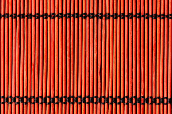 Фон из красной бамбуковой скатерти — стоковое фото