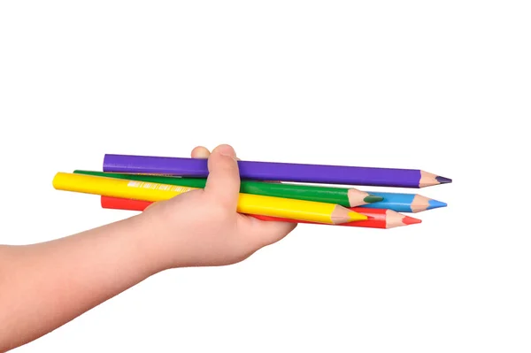 Children's hand holds the colorful pencils — Stock Photo, Image