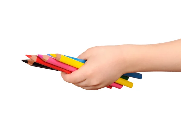 Children's hand holds the colorful pencils — Stock Photo, Image