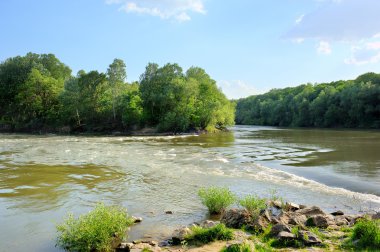 Summer landscape. River and clouds. clipart