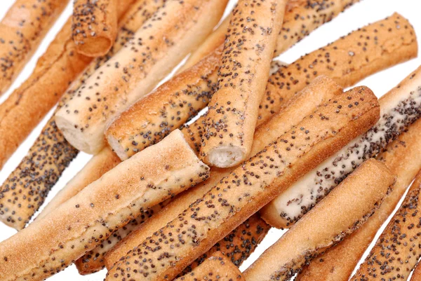 Tuzlu breadsticks ile izole haşhaş tohumu — Stok fotoğraf