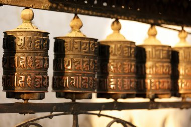 Tibetan prayer wheels clipart