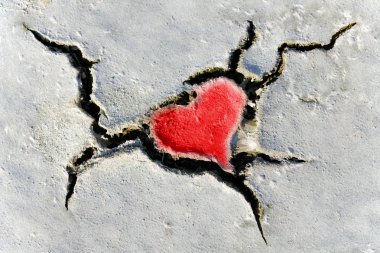 Heart shape in dry soil clipart