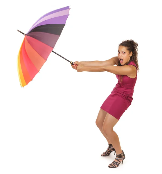 Woman fighting with wind — Stock Photo, Image