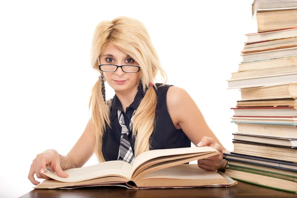 Schoolgirl reading book — Stock Photo, Image