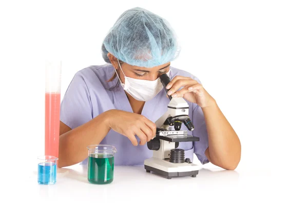Doctor using microscope — Stock Photo, Image