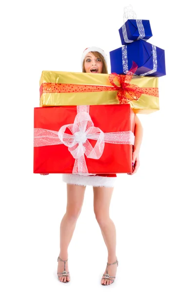 Christmas woman carrying gift pile — Stock Photo, Image