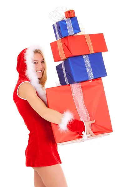 Donna di Natale che trasporta mucchio regalo — Foto Stock