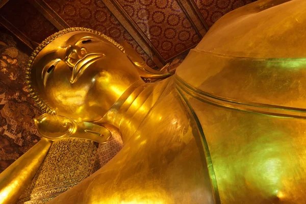Golden lying buddha — Stock Photo, Image