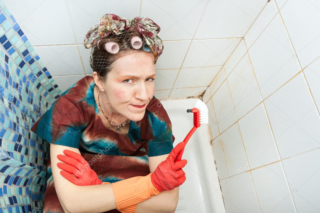 Woman and dirty bathroom
