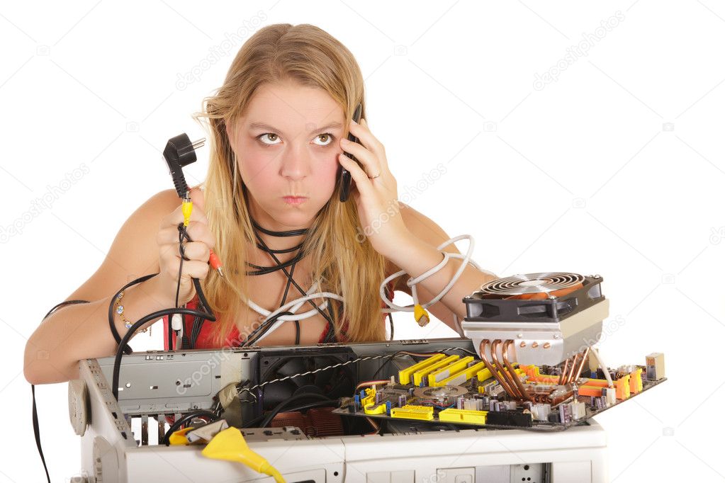 Bored woman repairing computer