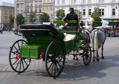 Cabby in Cracow, Poland - Old Town square clipart