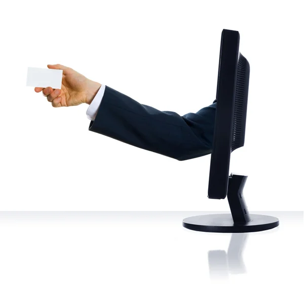 A hand sticking out giving a business card — Stock Photo, Image
