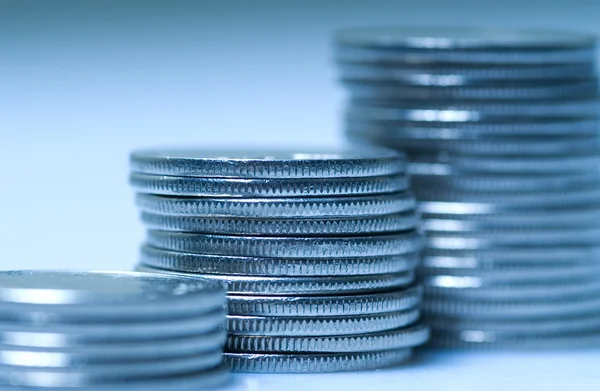Coins in blue — Stock Photo, Image