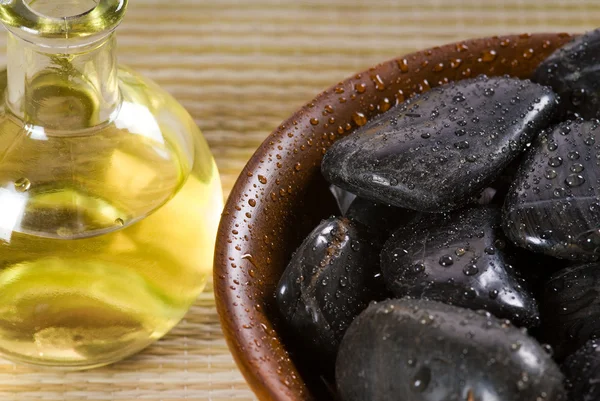 Oil and stones — Stock Photo, Image