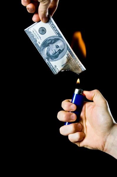 Geld verbrennen — Stockfoto