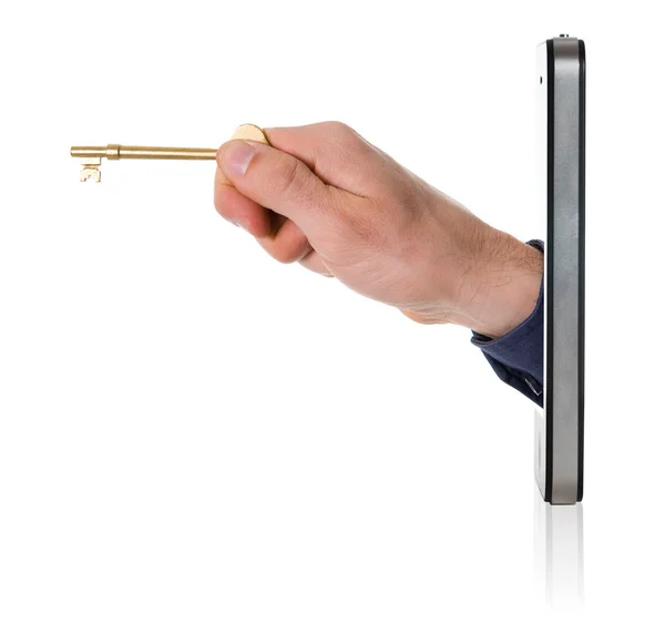 Hand met gouden sleutel op smart phone — Stockfoto