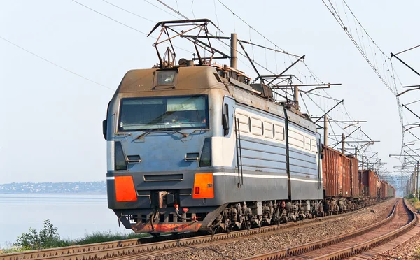 Freight train on a bank of the Dnieper — Stock Photo, Image
