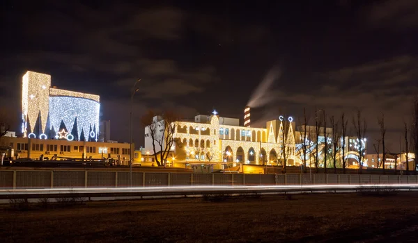Sweet factory illuminated — Stock Photo, Image