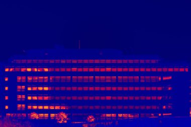 Glassy office building in thermal imaging simulation clipart