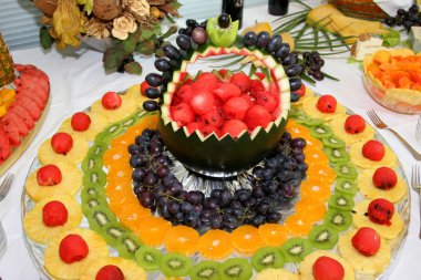 Fruit ornaments on a table clipart